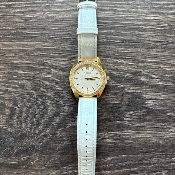NTOW Caravelle By Bulova Women’s Watch Gold Gemmed Bezel White Leather Band S/M